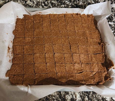 Scoring the dough into squares with a knife before baking
