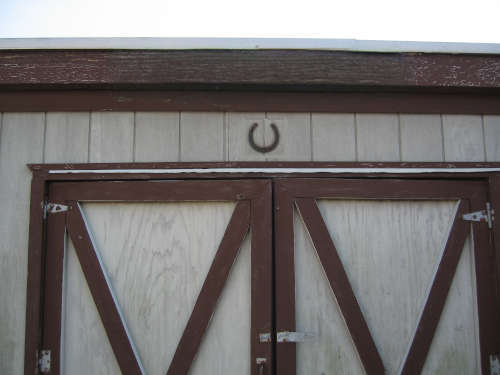 photo of horseshoe over door