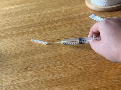 recapping a needle using the scoop method
